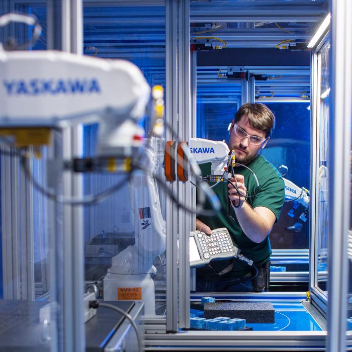 Western Technical College student working in a Western robotics lab