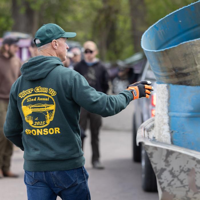 Volunteer helping at River Clean Up