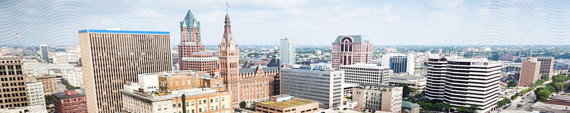 Panoramic color photo of downtown Milwaukee, as displayed on the Wisconsin Public Radio website