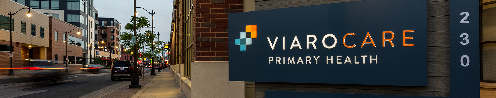 View of ViaroCare sign in front of bulding.